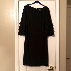 Elegant black dress with ruffled sleeves